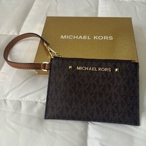 NWOT Michael Kors wristlet 4” x 6” authentic brown with gold hardware‎